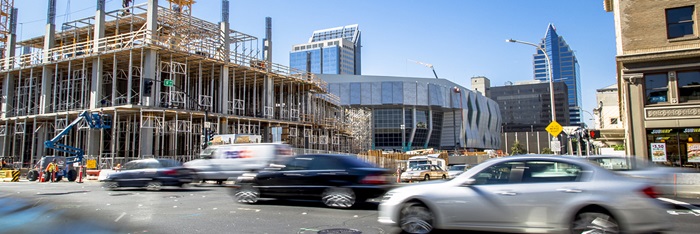 Sacramento Golden 1 Arena construction with street traffic